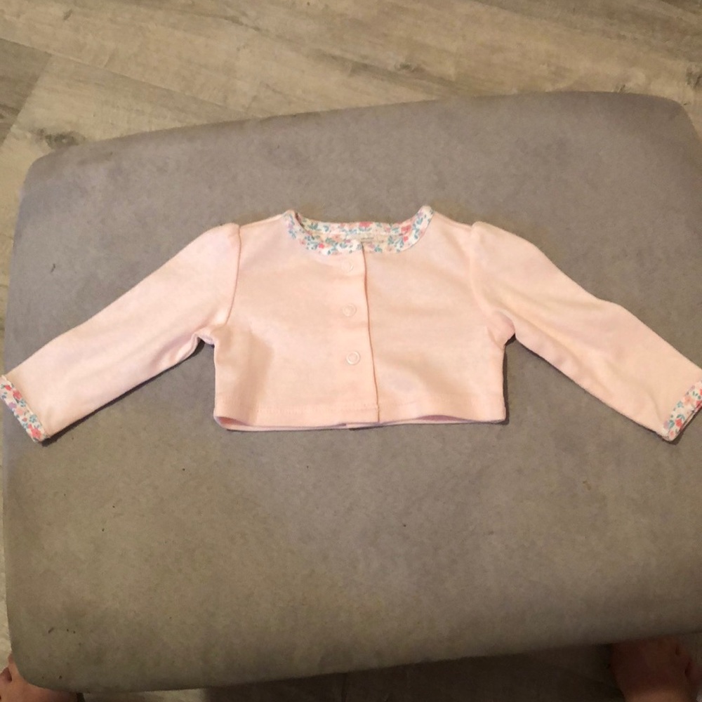 Never used Carter’s newborn outfit